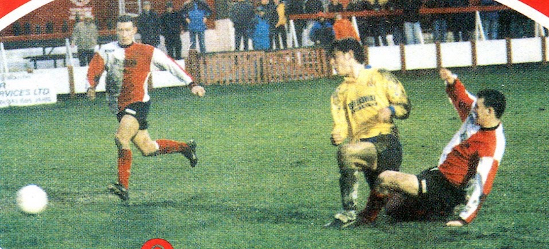 Rob Haworth scores at Ashton Utd